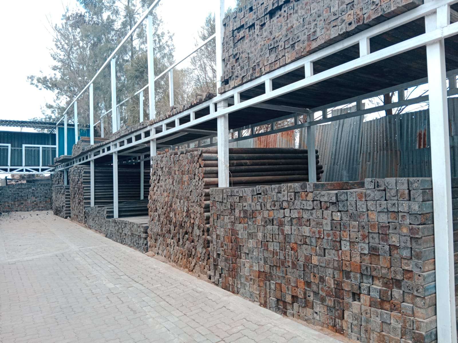 Neatly Arranged Stock Of Fence Posts Recycled From Plastics Ready For Delivery From East Africa Nairboi Kenya
